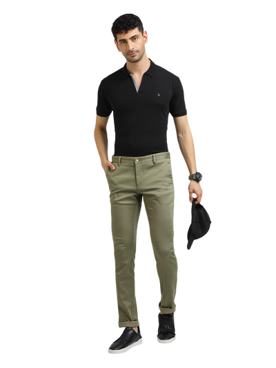Model wearing Clarke Gable's Mint Trim Fit Trousers in a casual setting