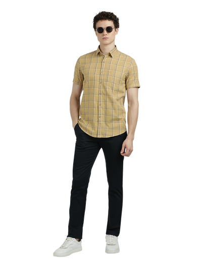 Model wearing Clarke Gable's Mustard Yellow Checked Semi Casual Shirt in a casual setting