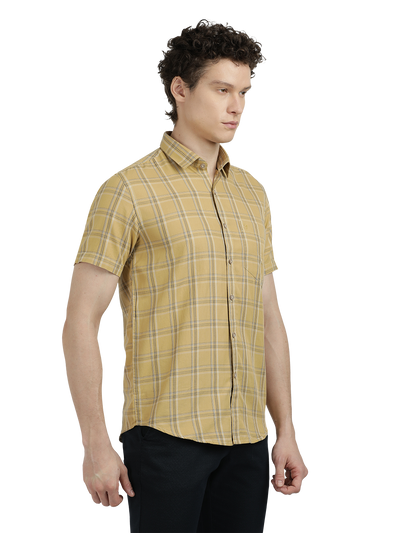 Model wearing Clarke Gable's Mustard Yellow Checked Semi Casual Shirt in a casual setting