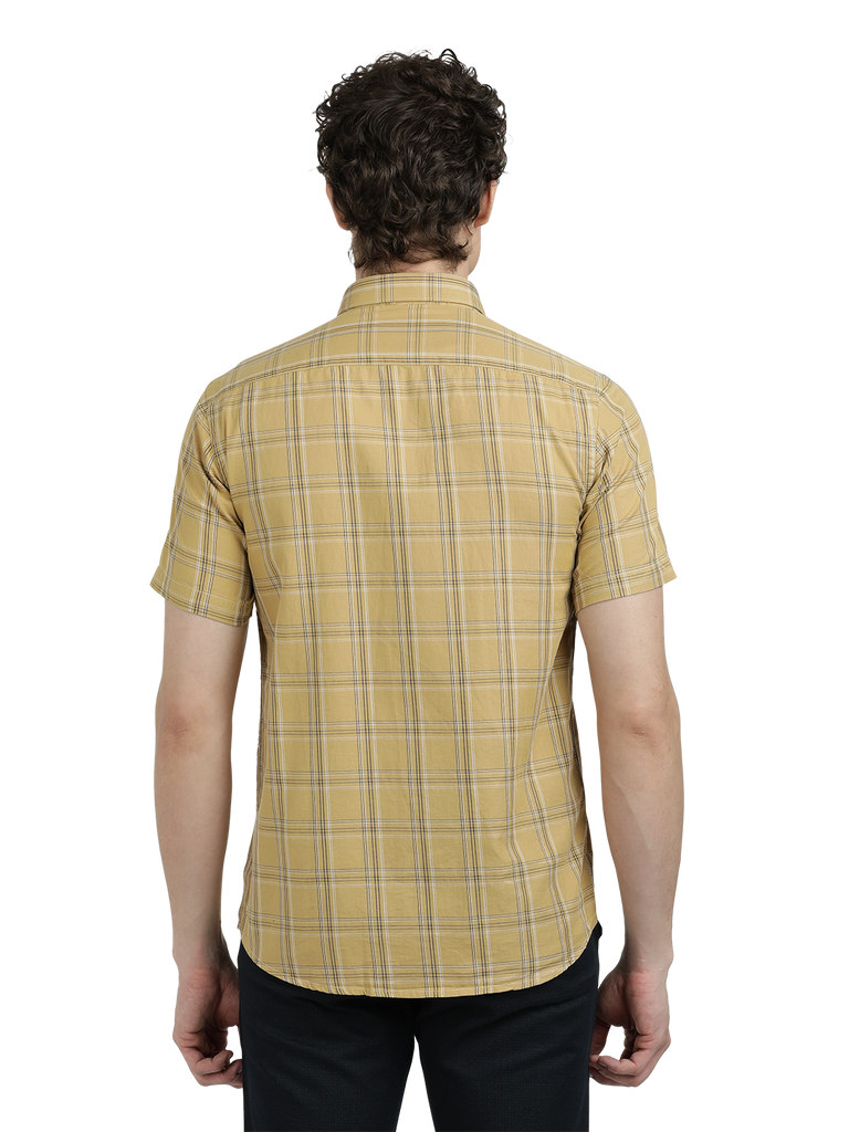 Model wearing Clarke Gable's Mustard Yellow Checked Semi Casual Shirt in a casual setting