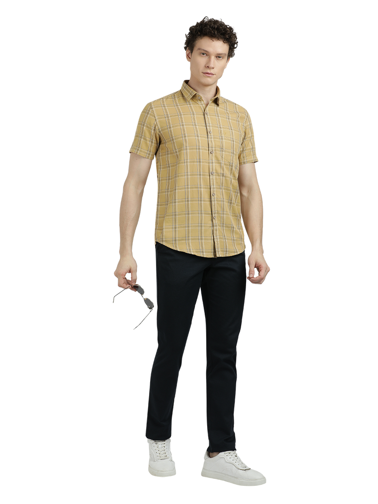 Model wearing Clarke Gable's Mustard Yellow Checked Semi Casual Shirt in a casual setting