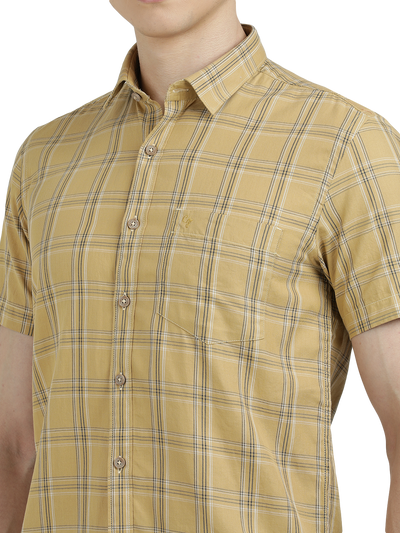 Model wearing Clarke Gable's Mustard Yellow Checked Semi Casual Shirt in a casual setting