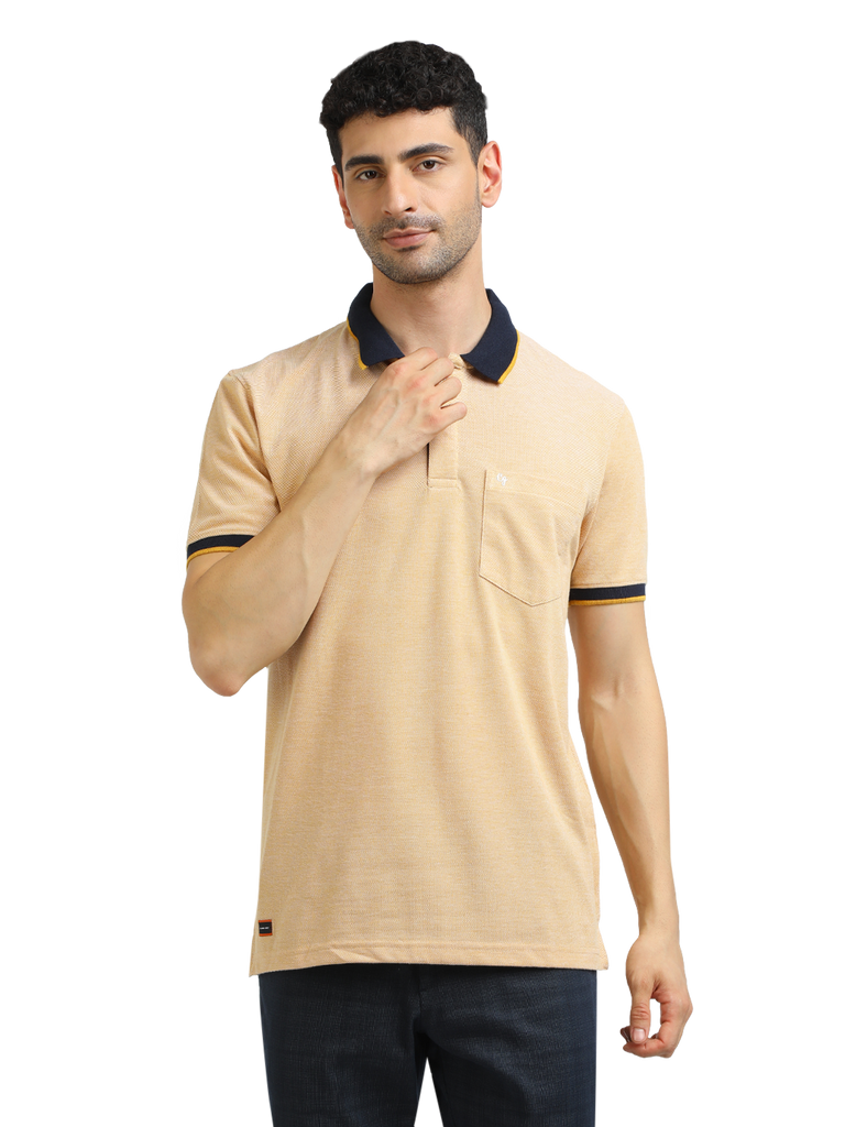 Model wearing Clarke Gable's Mustard Yellow Solid Polo Collar T-Shirt in a casual setting