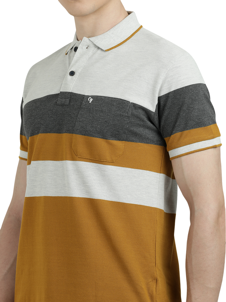 Model wearing Clarke Gable's Mustard Yellow With White Striped Polo Collar T-Shirt in a casual setting