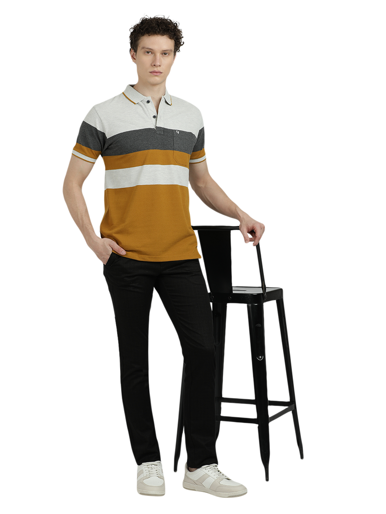 Model wearing Clarke Gable's Mustard Yellow With White Striped Polo Collar T-Shirt in a casual setting