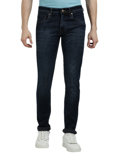 Model wearing Clarke Gable's Navy Blue Faded Skinny Fit Jeans in a casual setting