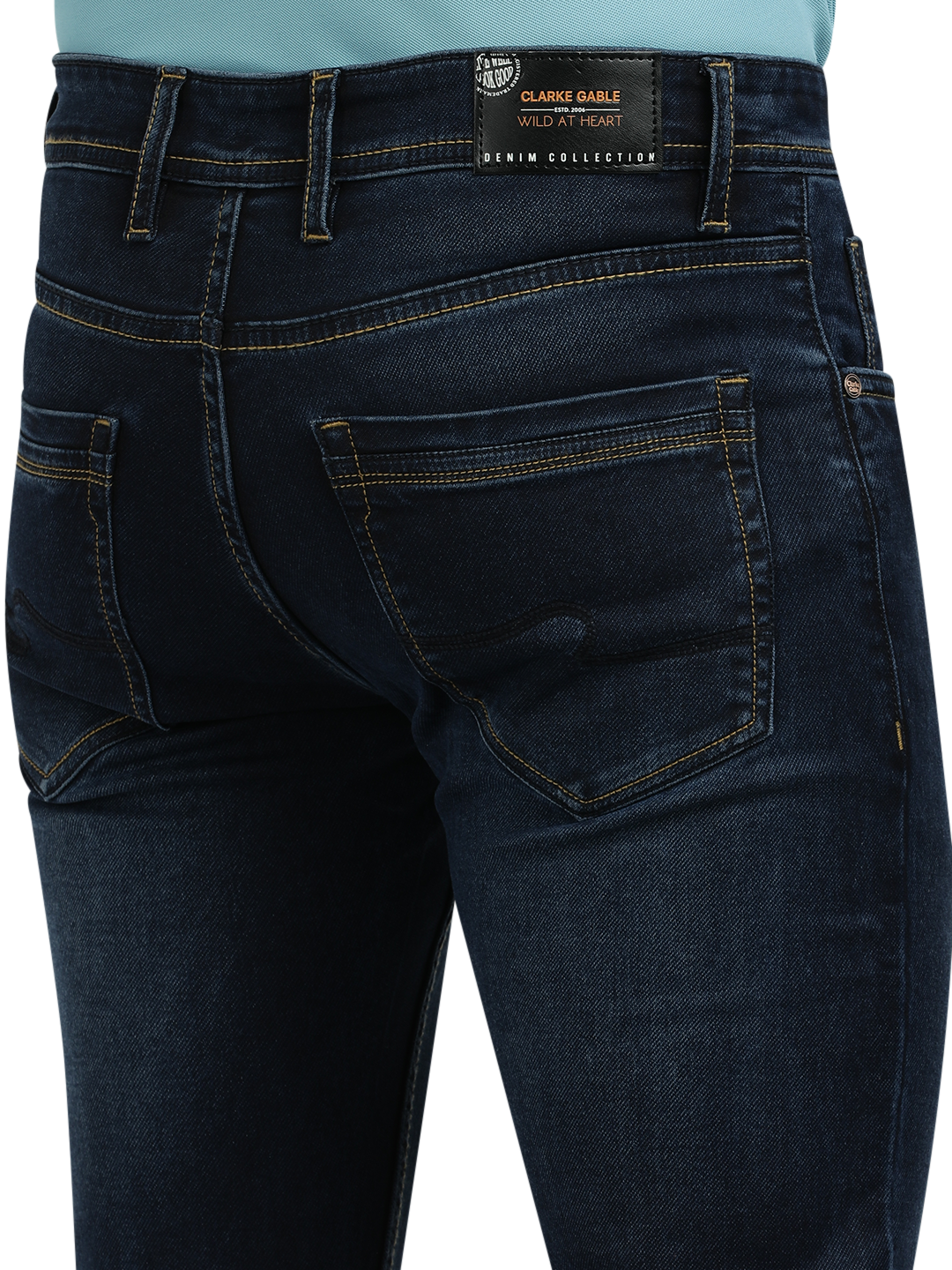 Model wearing Clarke Gable's Navy Blue Faded Skinny Fit Jeans in a casual setting