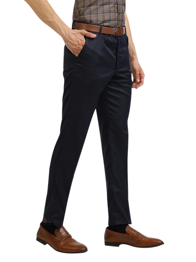Model wearing Clarke Gable's Navy Blue Casual Fit Trousers in a casual setting