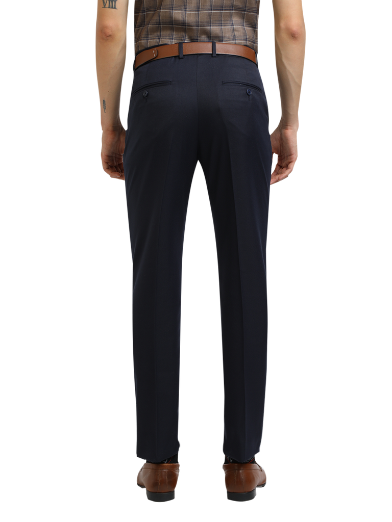 Model wearing Clarke Gable's Navy Blue Casual Fit Trousers in a casual setting