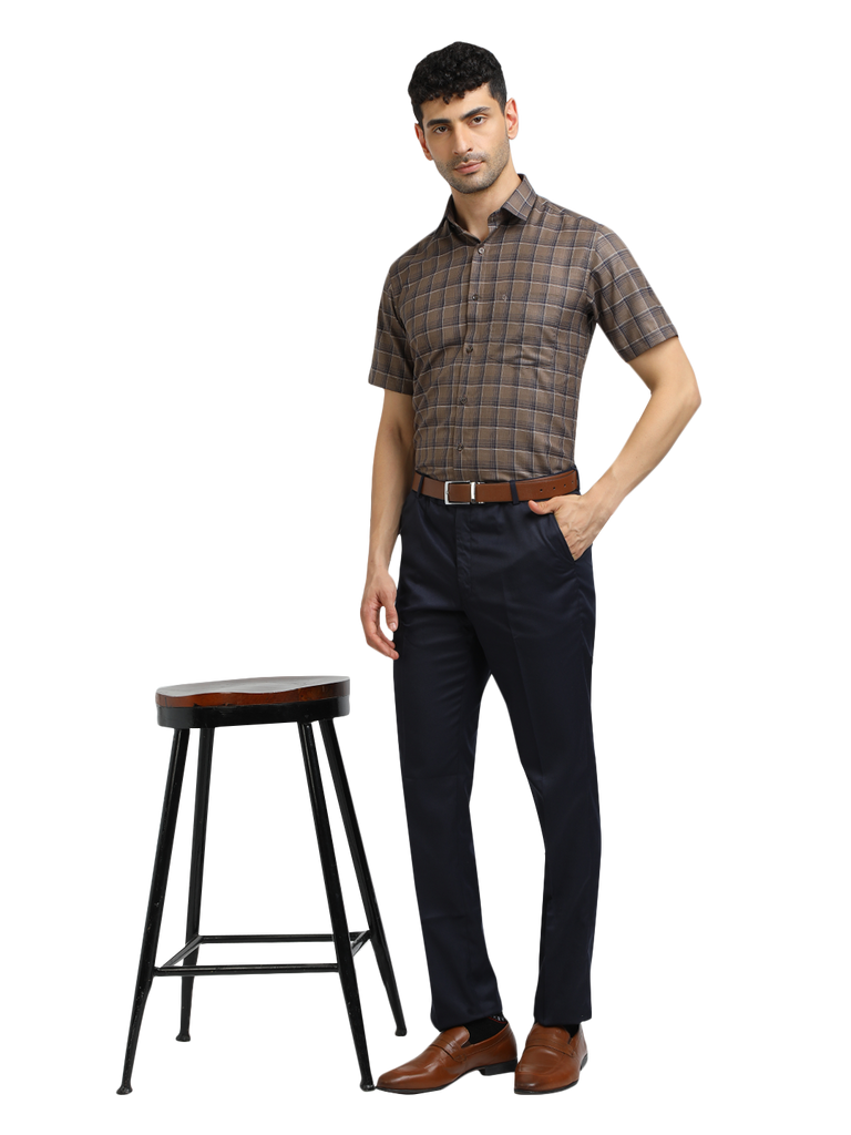 Model wearing Clarke Gable's Navy Blue Casual Fit Trousers in a casual setting