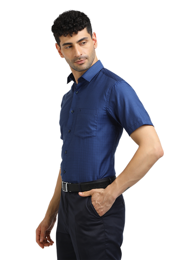 Model wearing Clarke Gable's Navy Blue Checked Formal Shirt in a casual setting