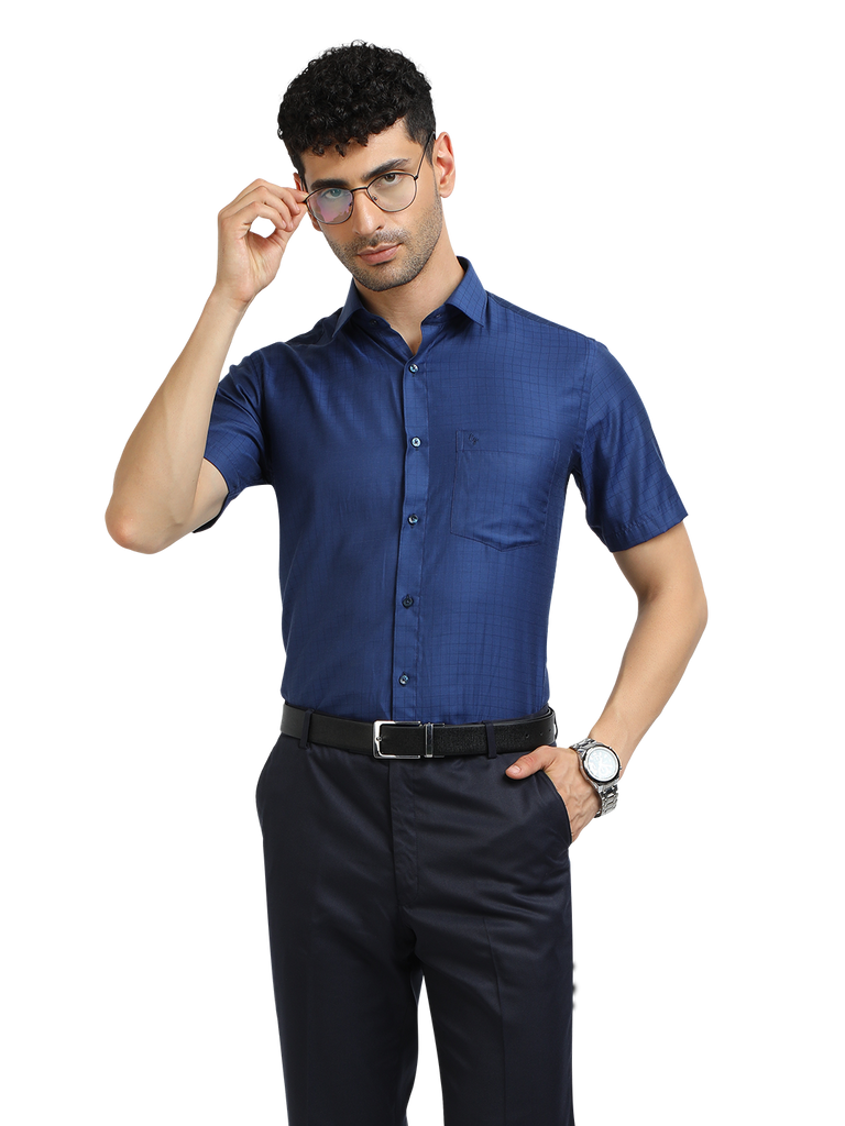 Model wearing Clarke Gable's Navy Blue Checked Formal Shirt in a casual setting