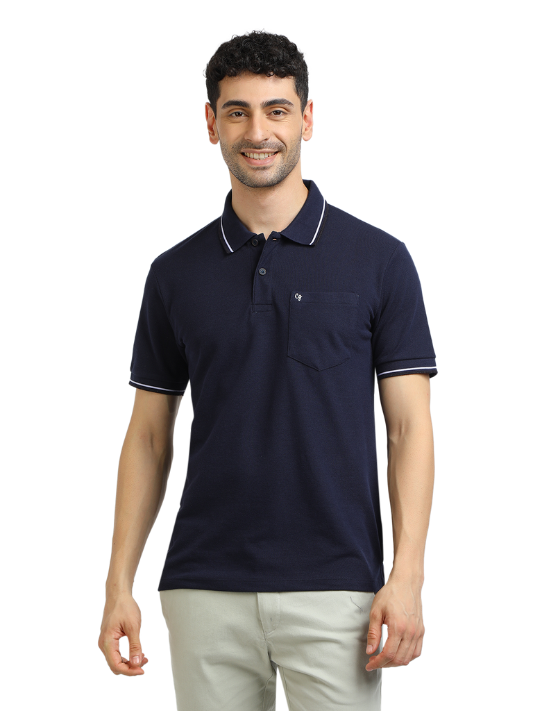 Model wearing Clarke Gable's Navy Blue Solid Polo Collar T-Shirt in a casual setting