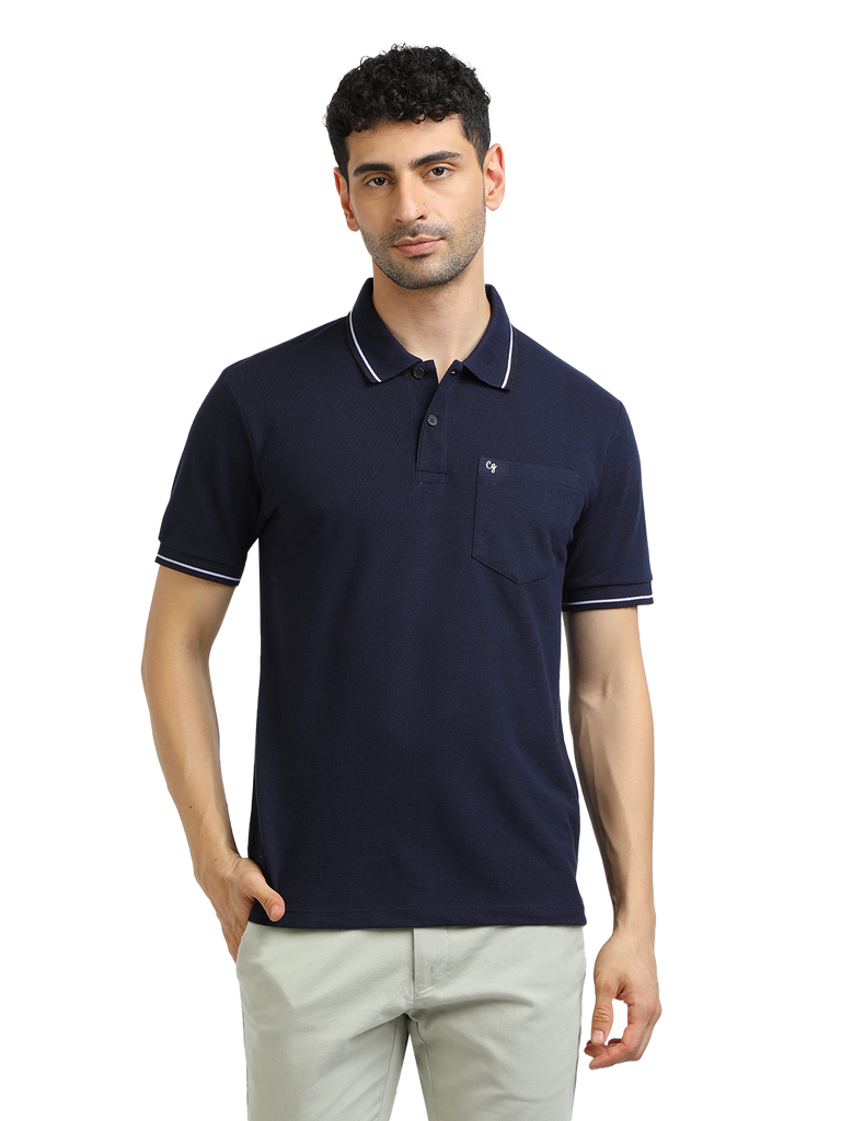 Model wearing Clarke Gable's Navy Blue Solid Polo Collar T-Shirt in a casual setting