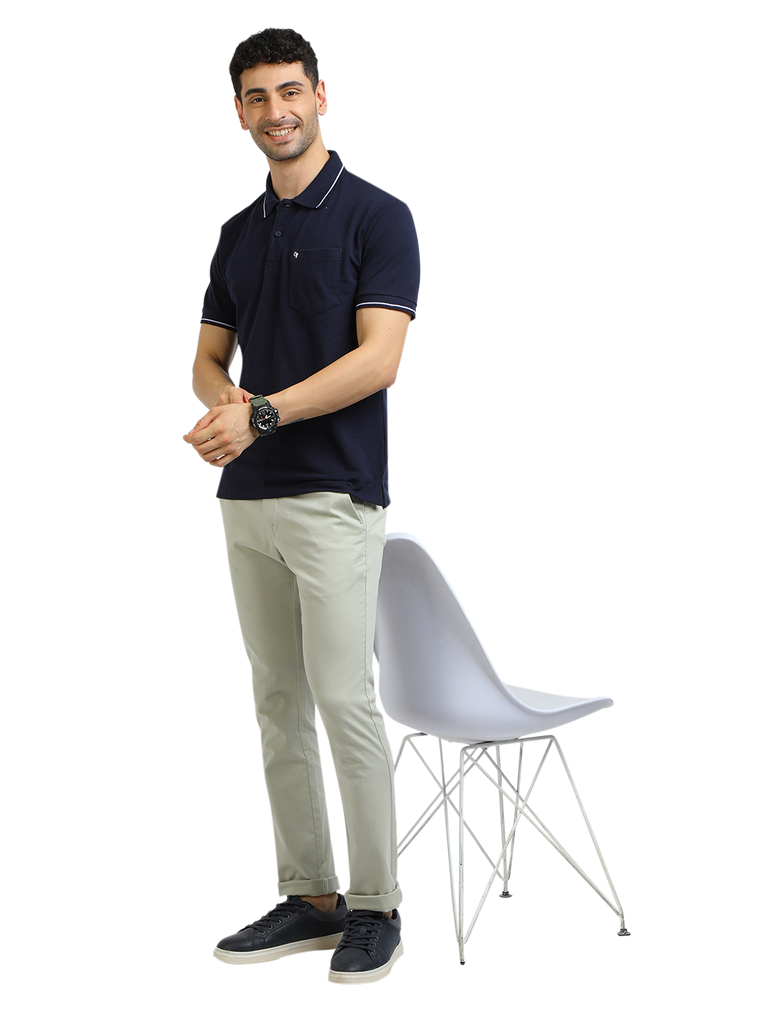 Model wearing Clarke Gable's Navy Blue Solid Polo Collar T-Shirt in a casual setting