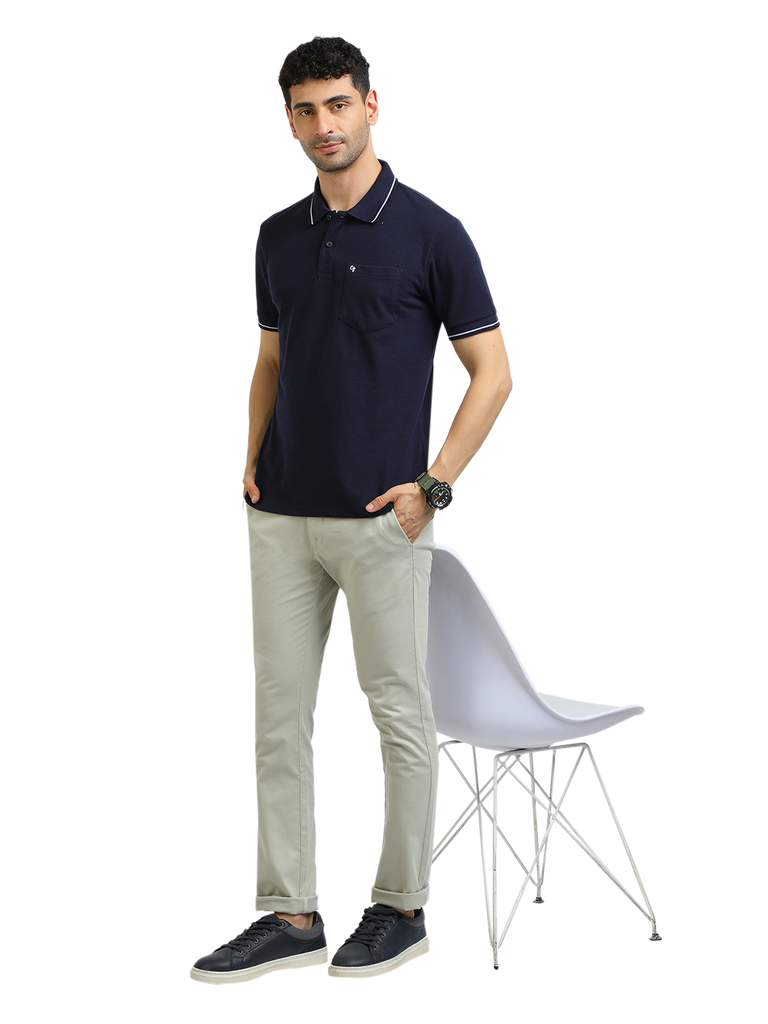 Model wearing Clarke Gable's Navy Blue Solid Polo Collar T-Shirt in a casual setting