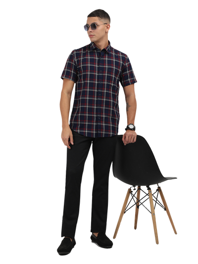 Model wearing Clarke Gable's Navy Blue With Red Checked Semi Casual Shirt in a casual setting