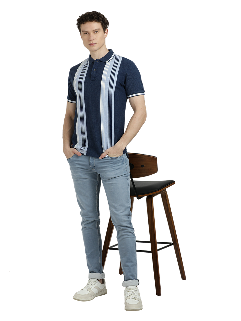 Model wearing Clarke Gable's Navy Blue with Light Blue Striped Polo Collar T-Shirt in a casual setting