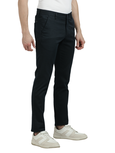 Model wearing Clarke Gable's Navy Custom Fit Trousers in a casual setting