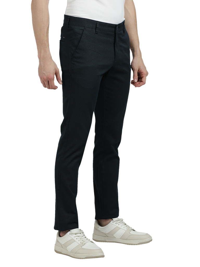 Model wearing Clarke Gable's Navy Custom Fit Trousers in a casual setting