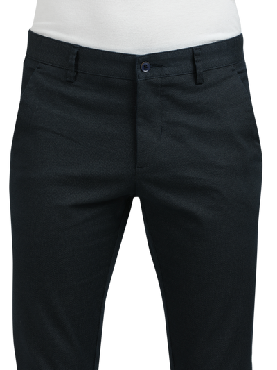 Model wearing Clarke Gable's Navy Custom Fit Trousers in a casual setting