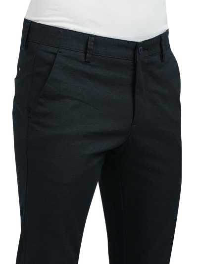 Model wearing Clarke Gable's Navy Custom Fit Trousers in a casual setting