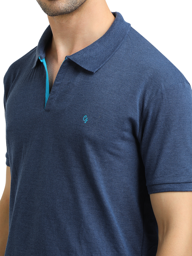 Model wearing Clarke Gable's Navy Melange Solid Polo Collar T-Shirt in a casual setting