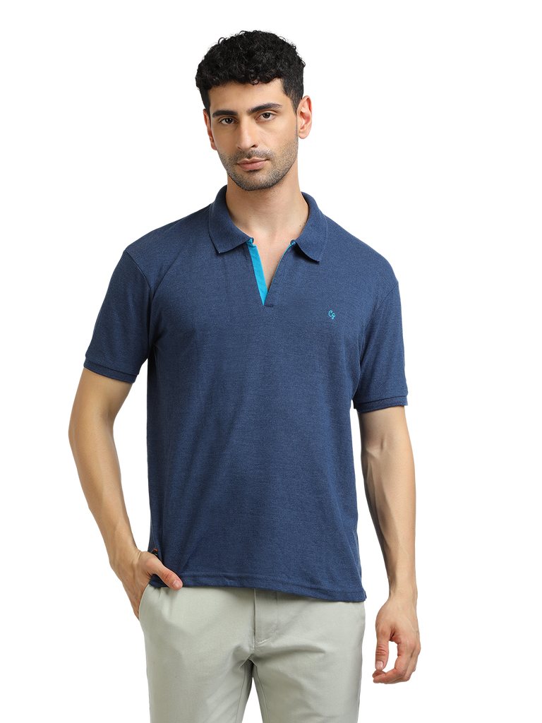 Model wearing Clarke Gable's Navy Melange Solid Polo Collar T-Shirt in a casual setting