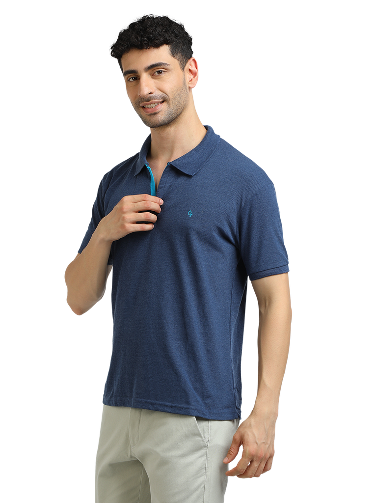 Model wearing Clarke Gable's Navy Melange Solid Polo Collar T-Shirt in a casual setting