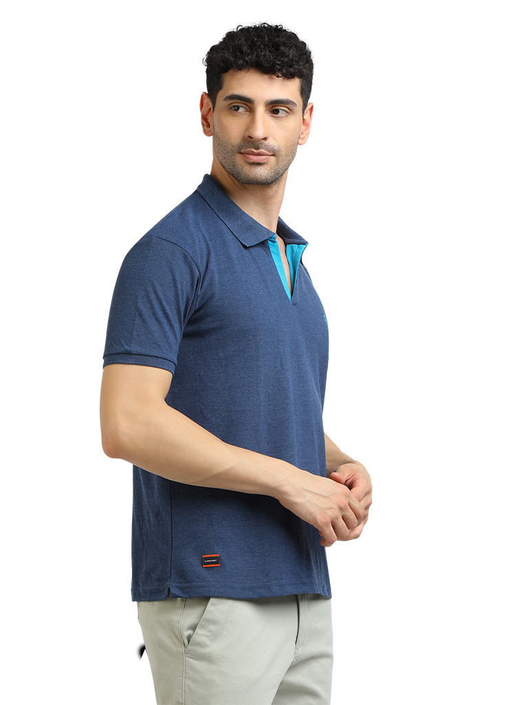 Model wearing Clarke Gable's Navy Melange Solid Polo Collar T-Shirt in a casual setting