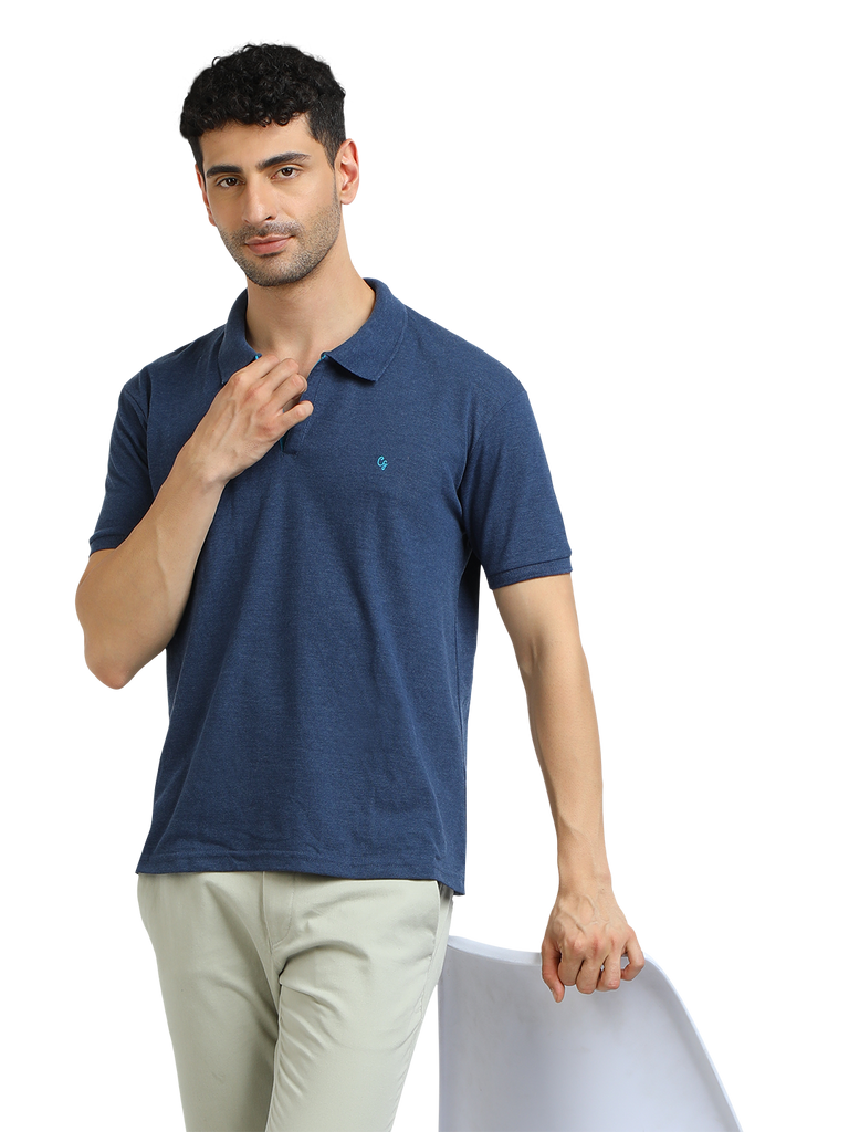 Model wearing Clarke Gable's Navy Melange Solid Polo Collar T-Shirt in a casual setting