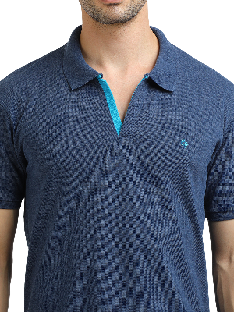 Model wearing Clarke Gable's Navy Melange Solid Polo Collar T-Shirt in a casual setting