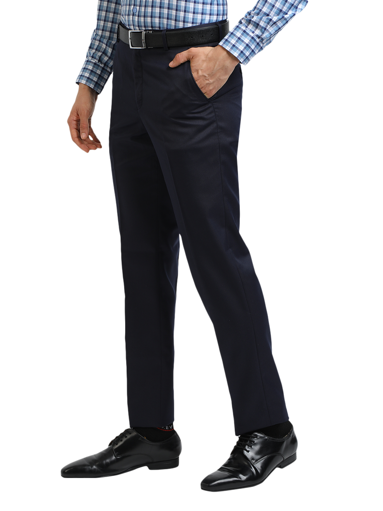 Model wearing Clarke Gable's Navy Smart Fit Trousers in a casual setting