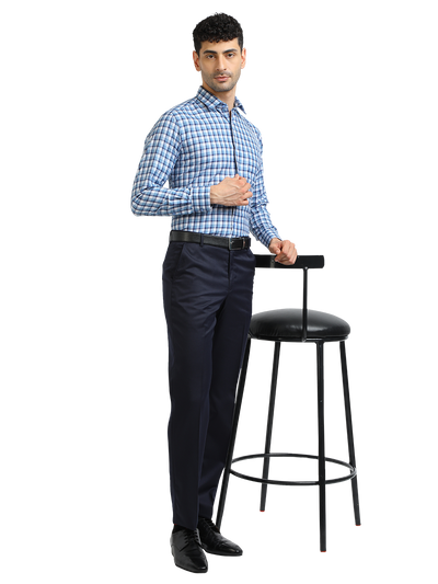 Model wearing Clarke Gable's Navy Smart Fit Trousers in a casual setting