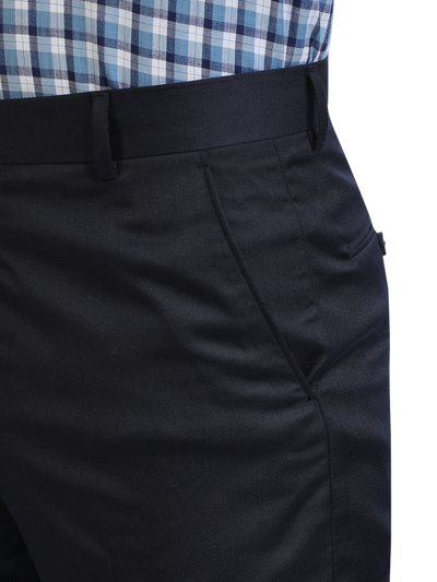 Model wearing Clarke Gable's Navy Smart Fit Trousers in a casual setting