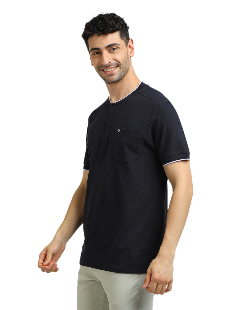 Model wearing Clarke Gable's Navy Solid Henley Neck T-Shirt in a casual setting