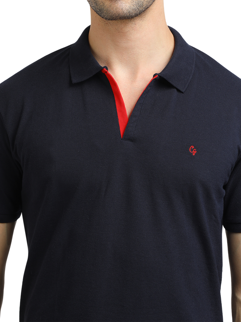 Model wearing Clarke Gable's Navy Solid Polo Collar T-Shirt in a casual setting