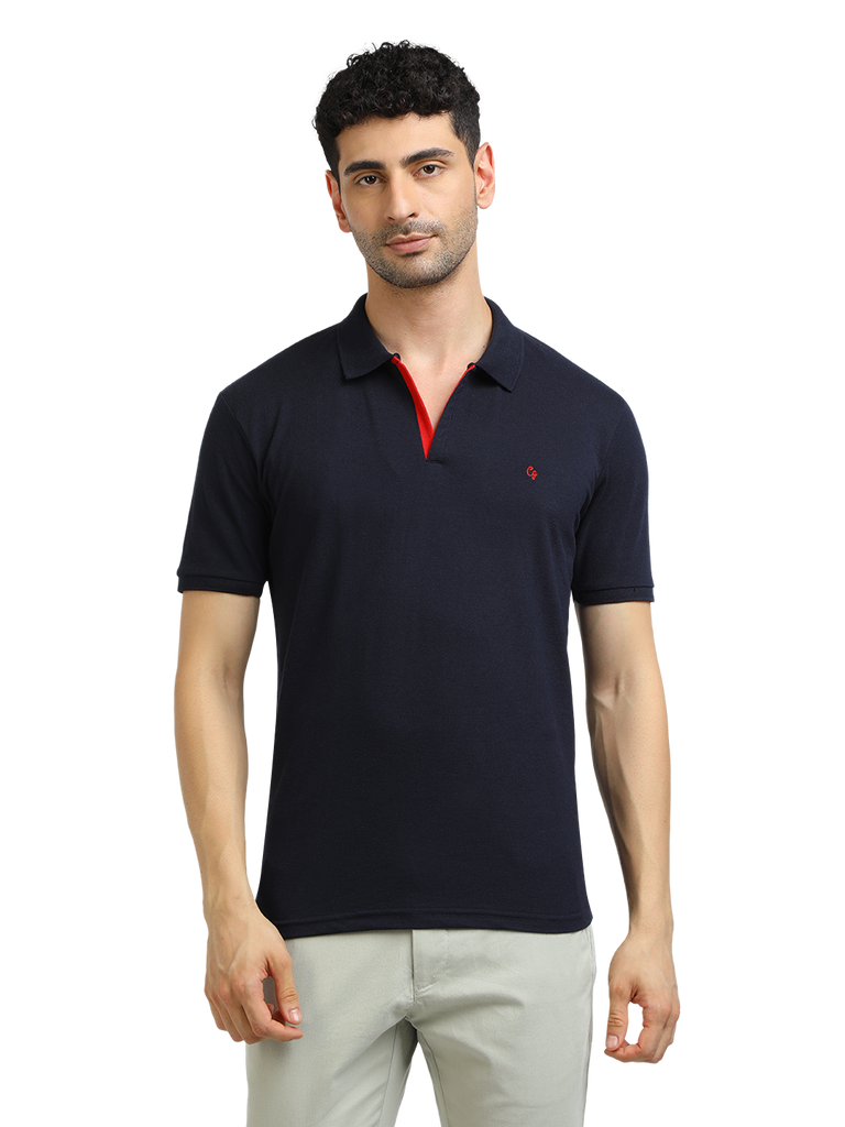 Model wearing Clarke Gable's Navy Solid Polo Collar T-Shirt in a casual setting