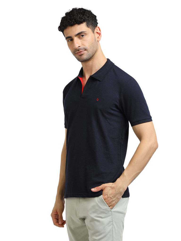 Model wearing Clarke Gable's Navy Solid Polo Collar T-Shirt in a casual setting