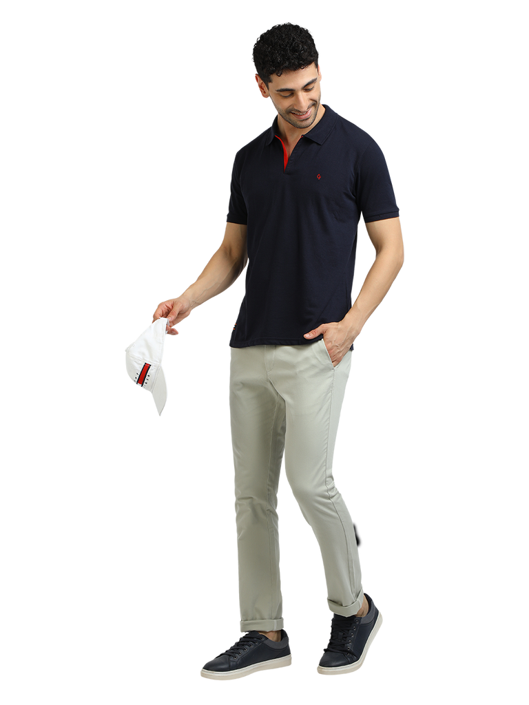 Model wearing Clarke Gable's Navy Solid Polo Collar T-Shirt in a casual setting