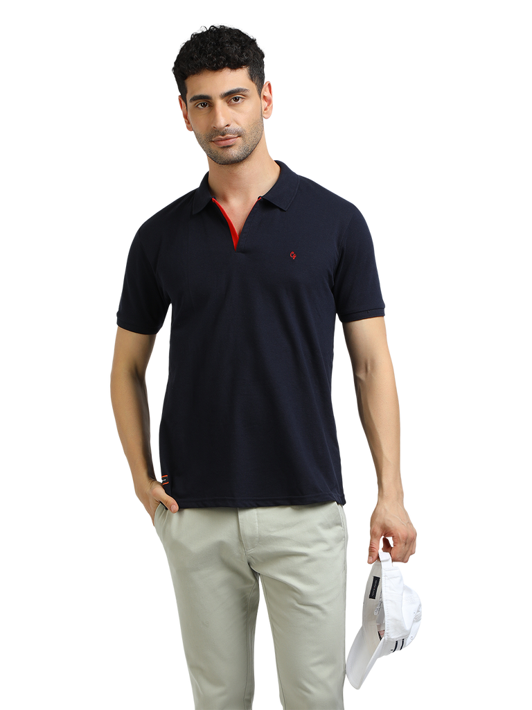 Model wearing Clarke Gable's Navy Solid Polo Collar T-Shirt in a casual setting