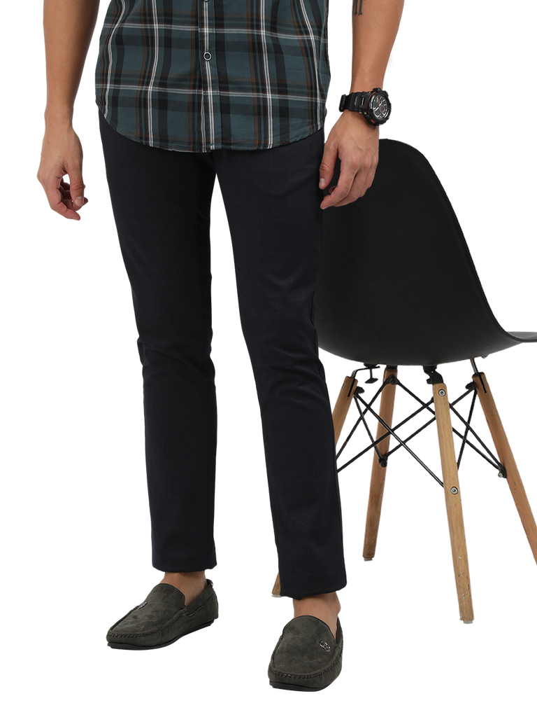 Model wearing Clarke Gable's Navy Trim Fit Trousers in a casual setting