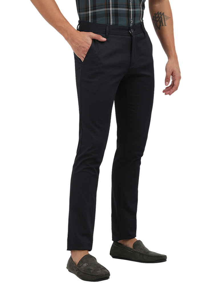 Model wearing Clarke Gable's Navy Trim Fit Trousers in a casual setting