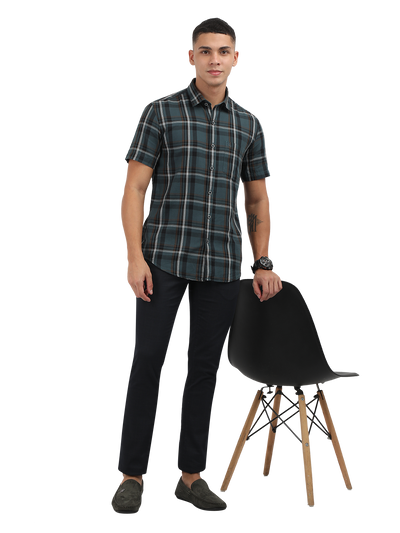 Model wearing Clarke Gable's Navy Trim Fit Trousers in a casual setting