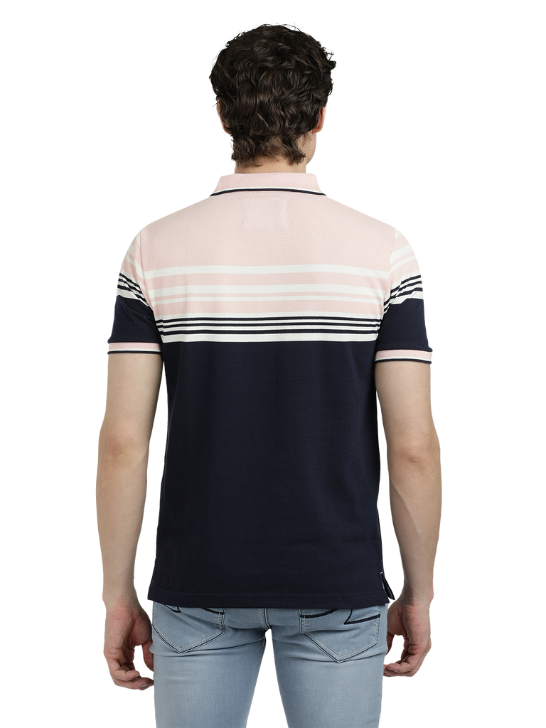 Model wearing Clarke Gable's Navy with Pink Striped Polo Collar T-Shirt in a casual setting