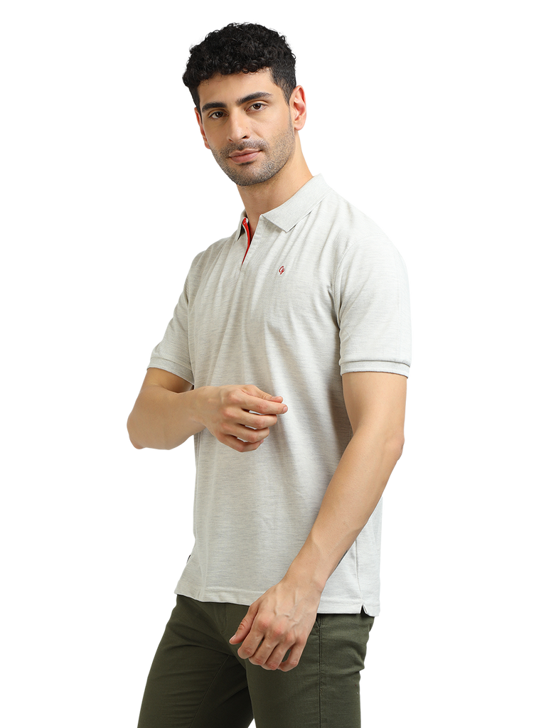 Model wearing Clarke Gable's Oatmeal Solid Polo Collar T-Shirt in a casual setting