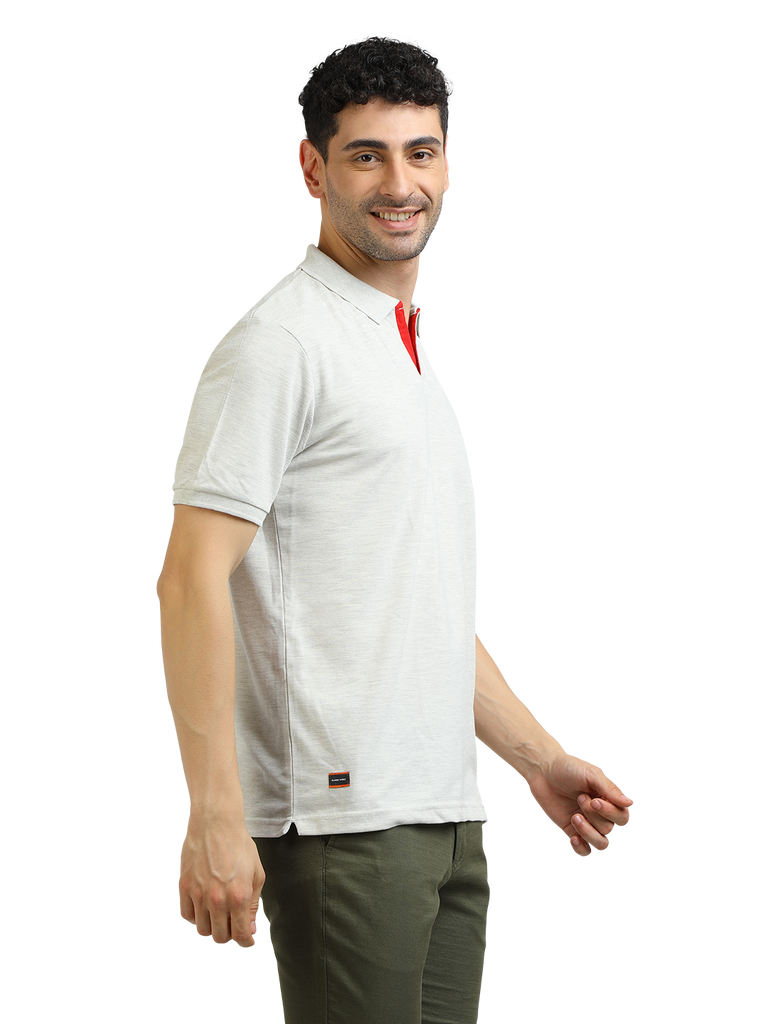 Model wearing Clarke Gable's Oatmeal Solid Polo Collar T-Shirt in a casual setting