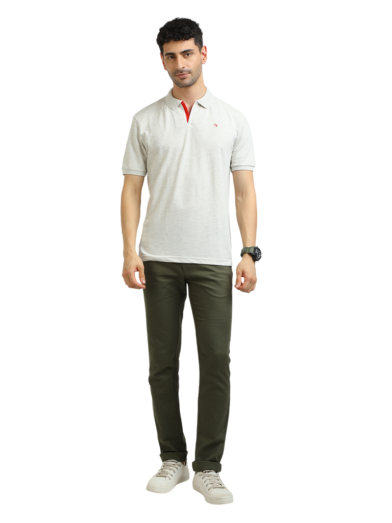 Model wearing Clarke Gable's Oatmeal Solid Polo Collar T-Shirt in a casual setting