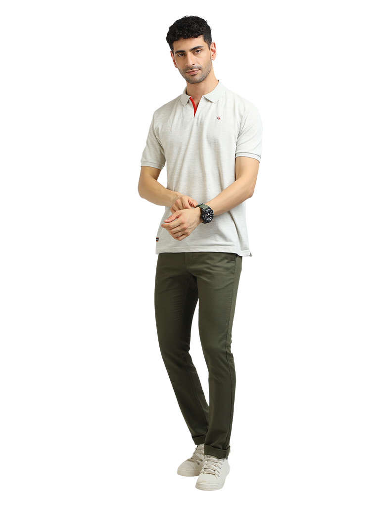 Model wearing Clarke Gable's Oatmeal Solid Polo Collar T-Shirt in a casual setting