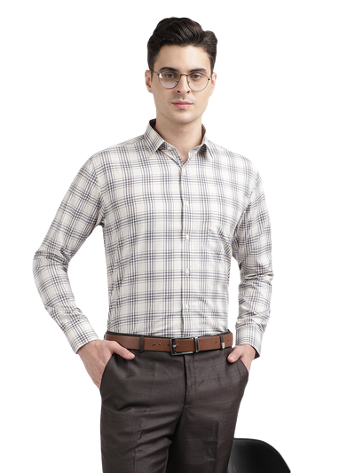 Model wearing Clarke Gable's Off-White With Brown Checked Formal Shirt in a casual setting